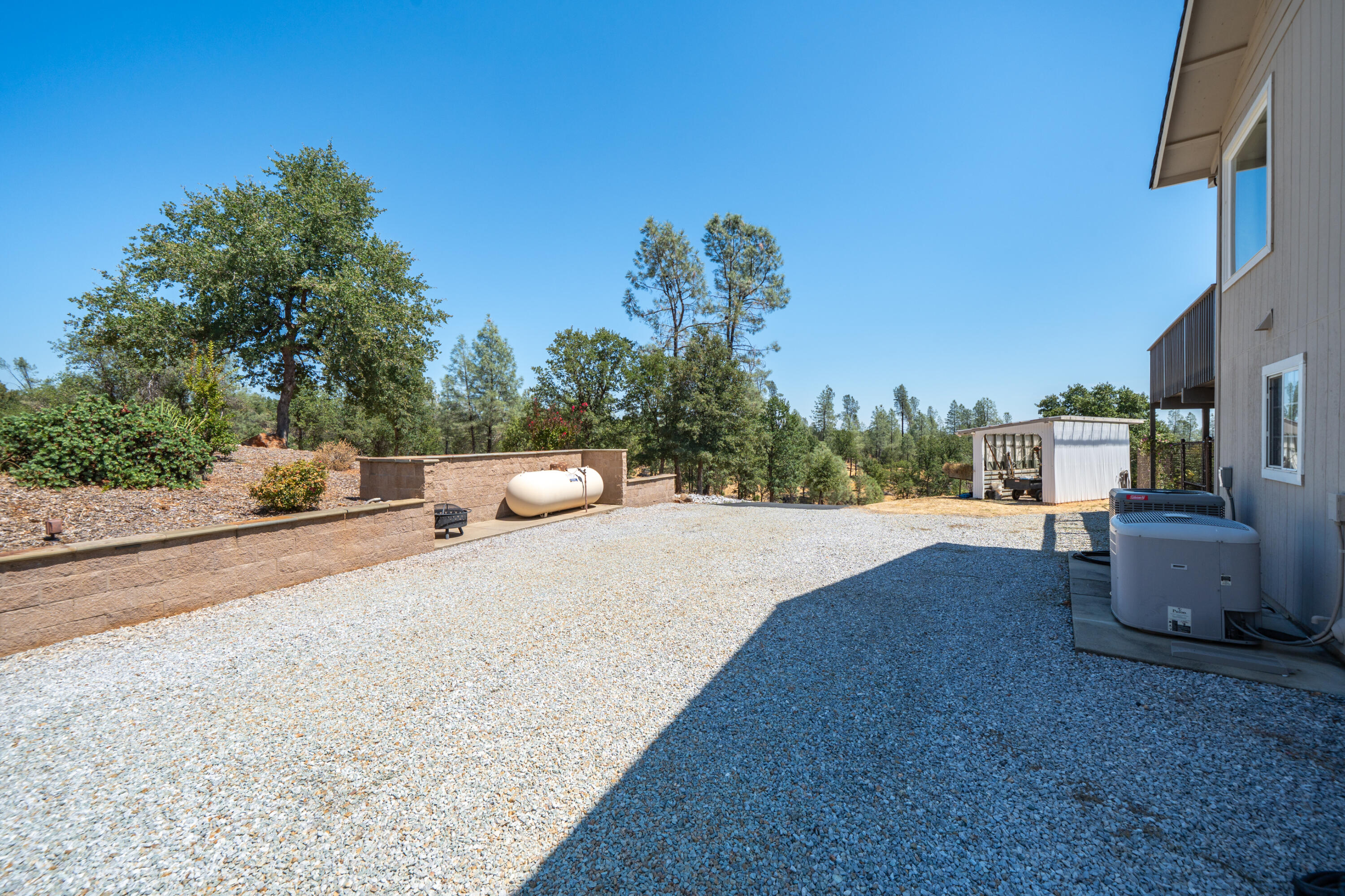 7954 Placer Road Redding, CA 96001 - Photo 59 of 97 a terrace of a house with outdoor seating