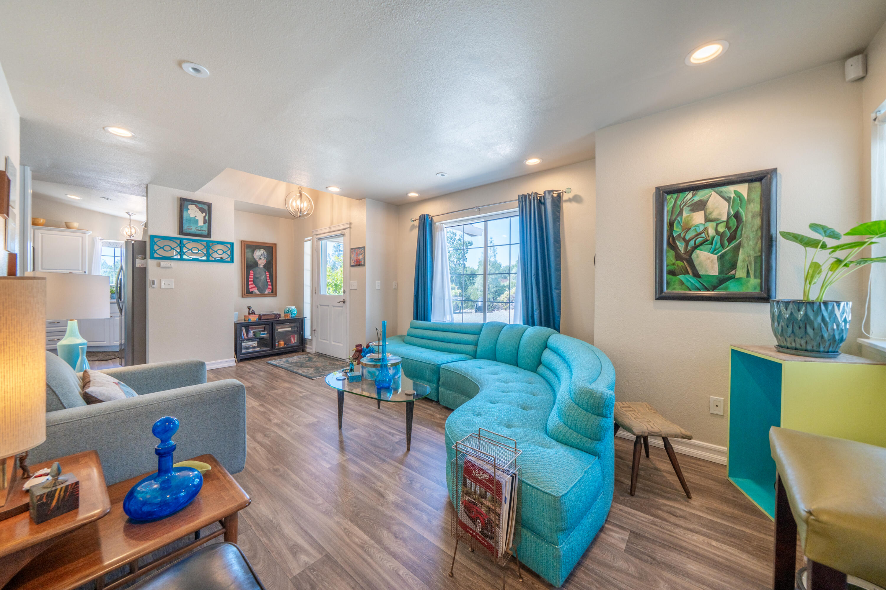 7954 Placer Road Redding, CA 96001 - Photo 7 of 97 a living room with furniture and a wooden floor