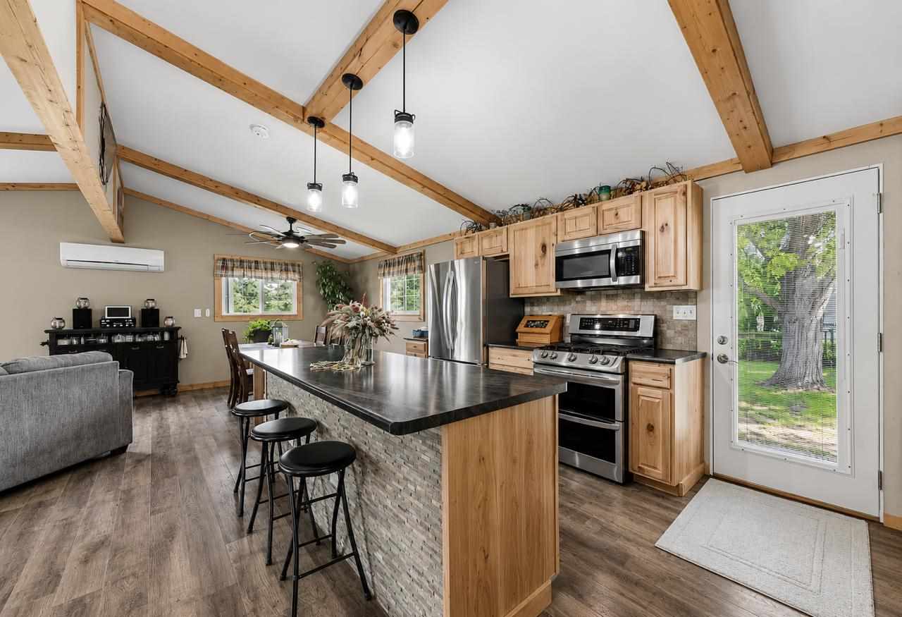 148 Delhi Road Manchester, IA 52057 - Photo 4 of 36 AI generated neutral wall color
