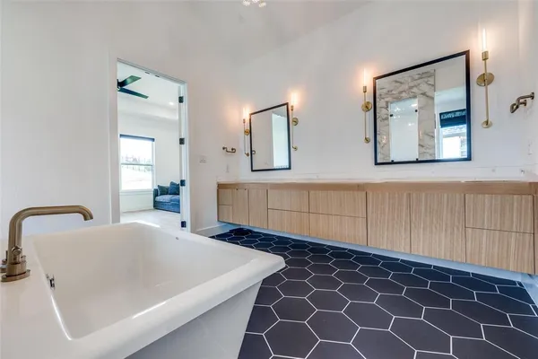 a bathroom with a bathtub and a sink