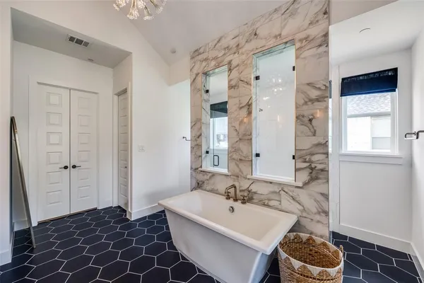 a bathroom with a sink and a mirror with toilet