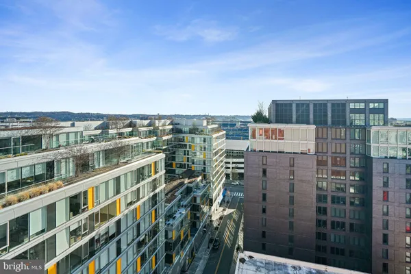 a view of a city with tall buildings