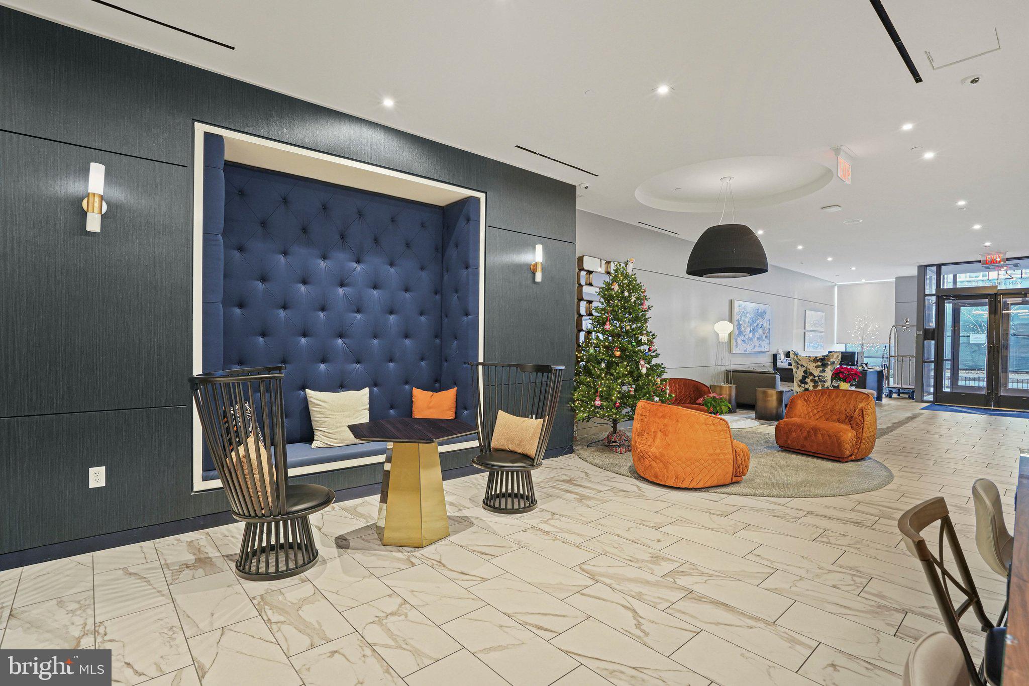 1211 Van Street Southeast, Unit 614 Washington, DC 20003 - Photo 16 of 21 a kitchen with a table and chairs