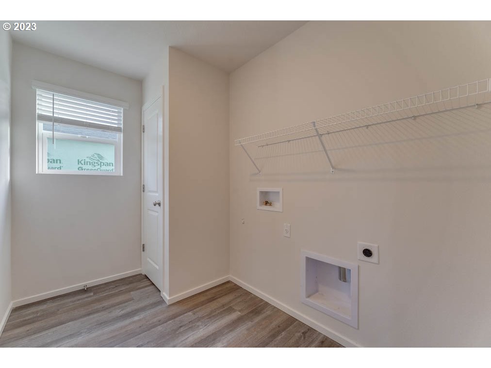 2612 26th Loop Springfield, OR 97477 - Photo 12 of 23 a view of an empty room with closet and a window