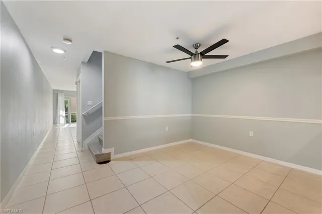 wooden floor in a hall with a window