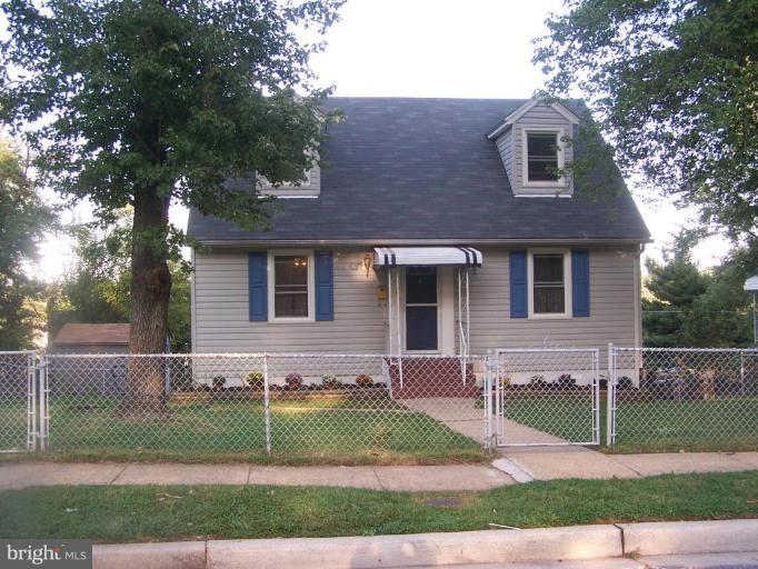 5553 Gayland Road Halethorpe, MD 21227 - Photo 1 of 12 a front view of a house with a yard