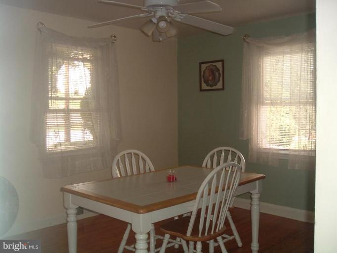 5553 Gayland Road Halethorpe, MD 21227 - Photo 2 of 12 a view of a dining room with furniture and window