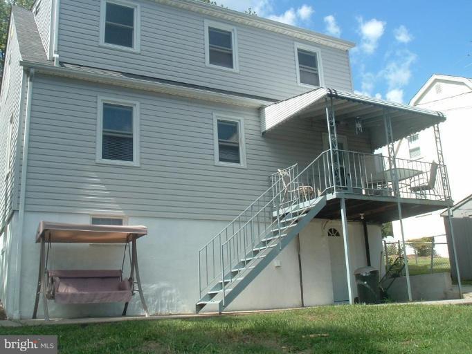 5553 Gayland Road Halethorpe, MD 21227 - Photo 11 of 12 a view of house with roof deck and furniture