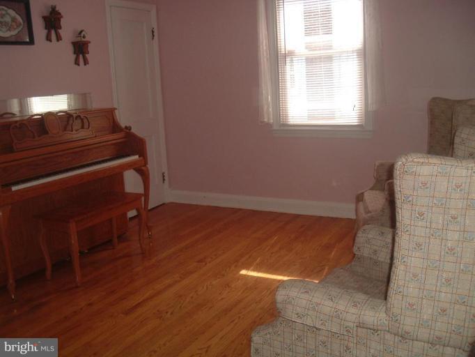 5553 Gayland Road Halethorpe, MD 21227 - Photo 3 of 12 a view of workspace with wooden floor