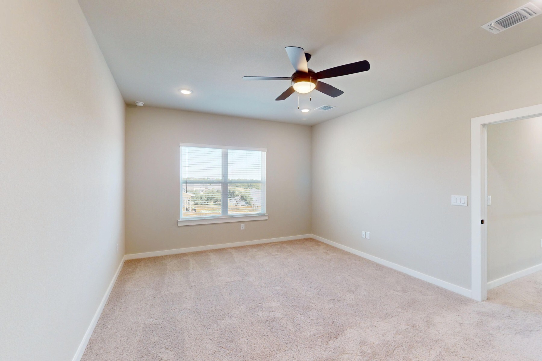 3679 Prosper Road Leander, TX 78641 - Photo 21 of 40 an empty room with windows and fan