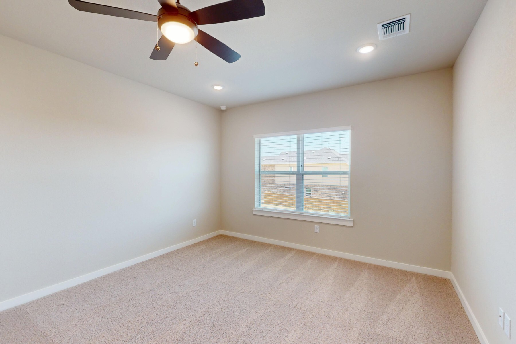 3679 Prosper Road Leander, TX 78641 - Photo 22 of 40 an empty room with a ceiling fan and a window