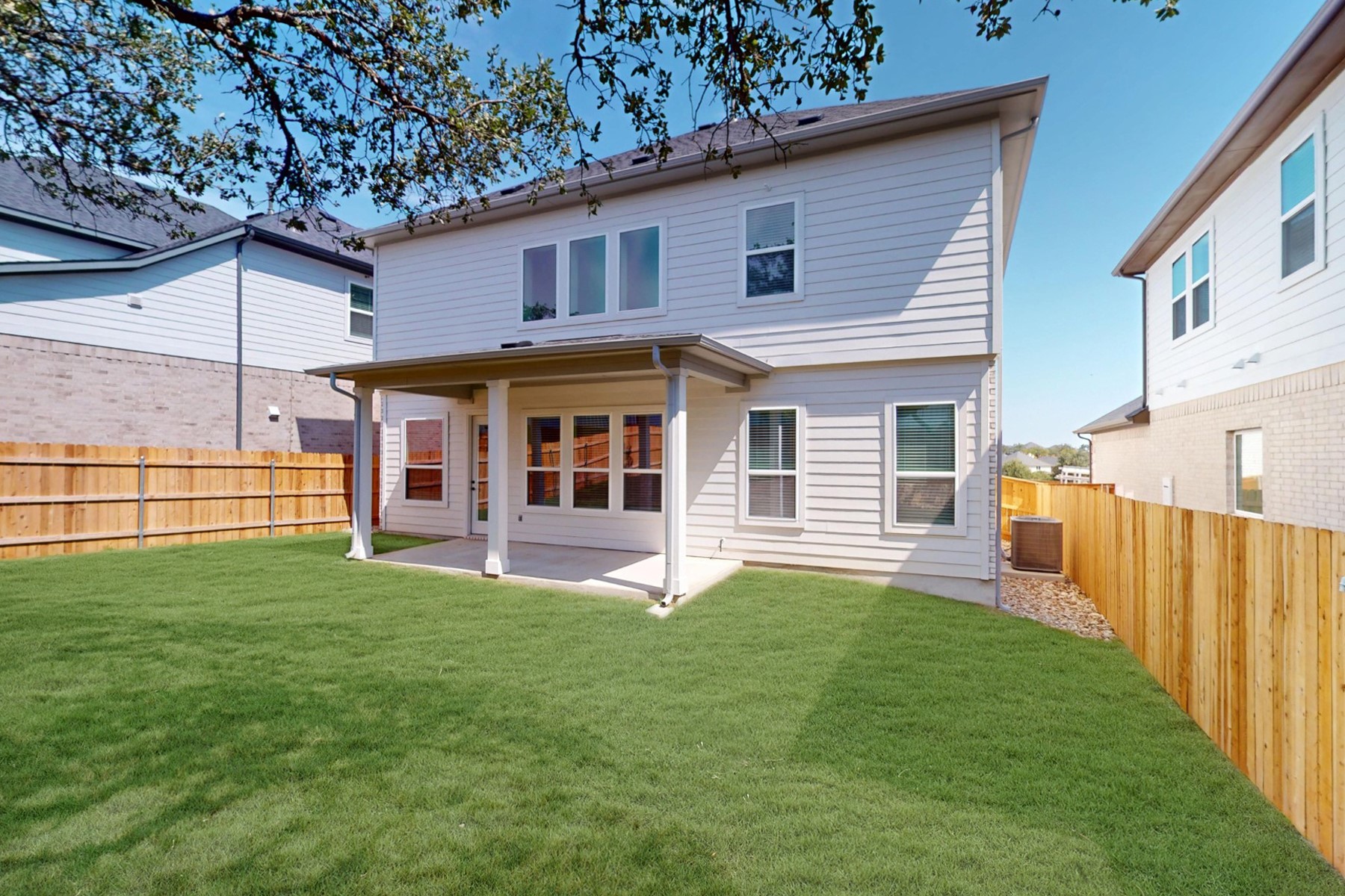 3679 Prosper Road Leander, TX 78641 - Photo 34 of 40 a front view of a house with a yard and porch
