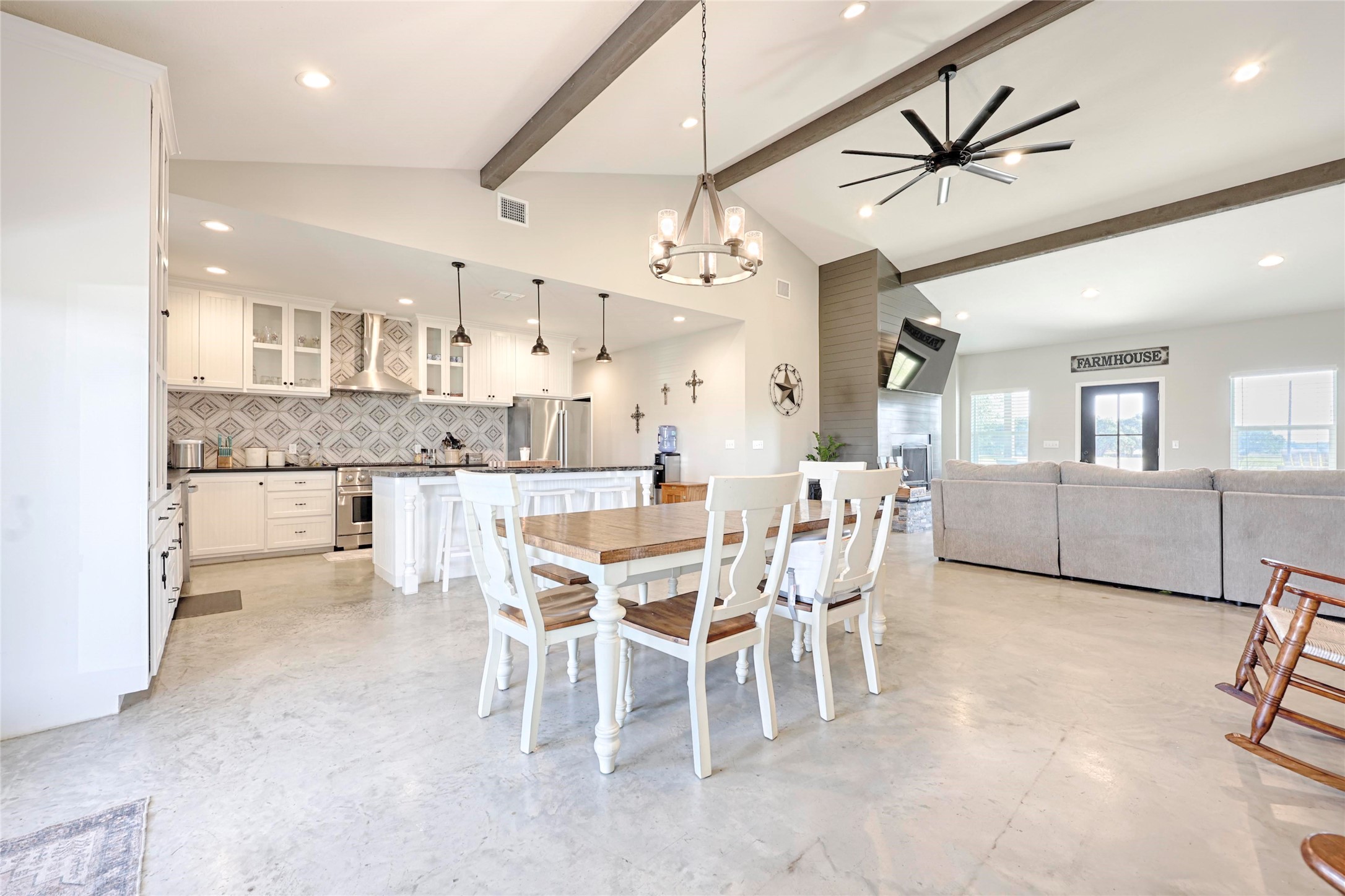 1100 Calhoun Road Eagle Lake, TX 77434 - Photo 15 of 48 a view of a dining area with furniture and a kitchen