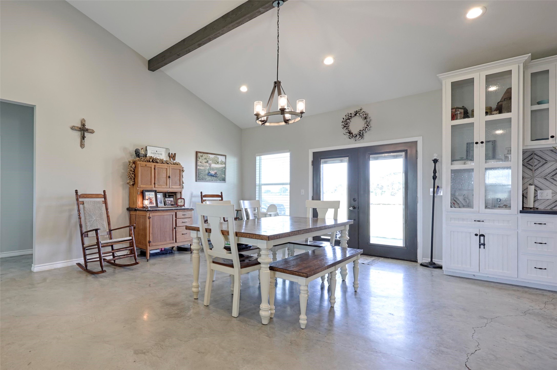 1100 Calhoun Road Eagle Lake, TX 77434 - Photo 16 of 48 a view of a dining room with furniture and chandelier