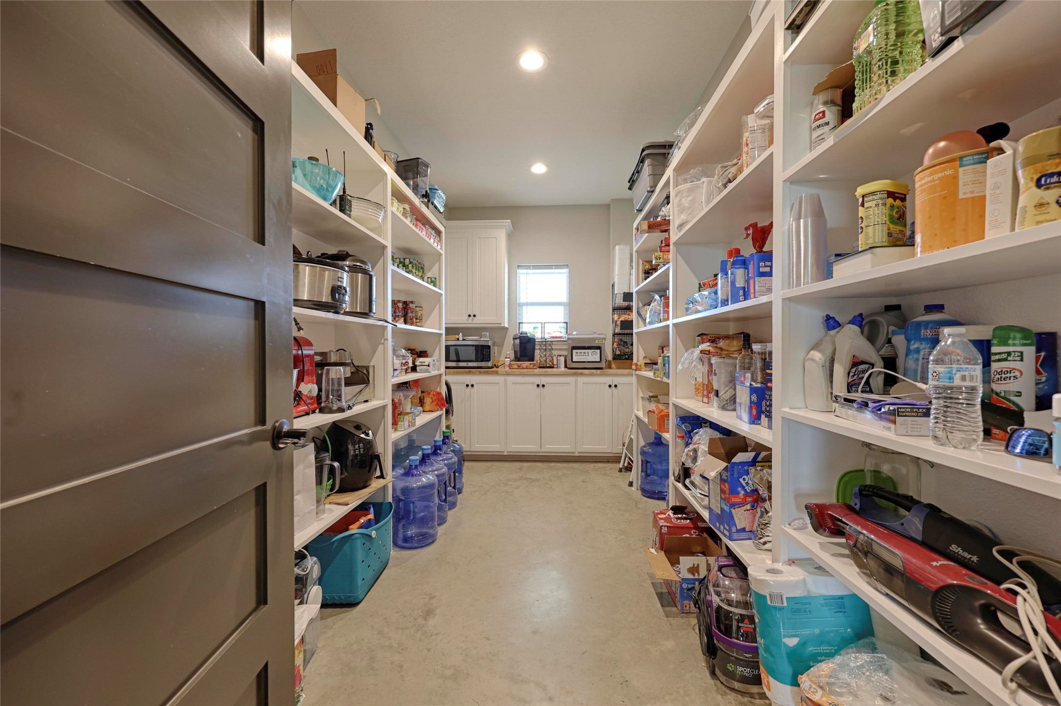 1100 Calhoun Road Eagle Lake, TX 77434 - Photo 22 of 48 a storage room with washer and closet