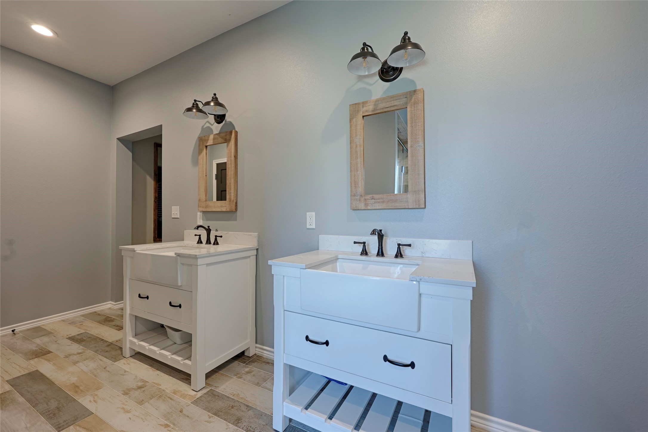 1100 Calhoun Road Eagle Lake, TX 77434 - Photo 29 of 48 a bathroom with a double vanity sink mirror and toilet