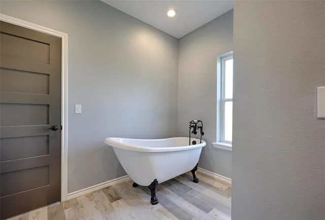 a bathroom with a toilet and a sink