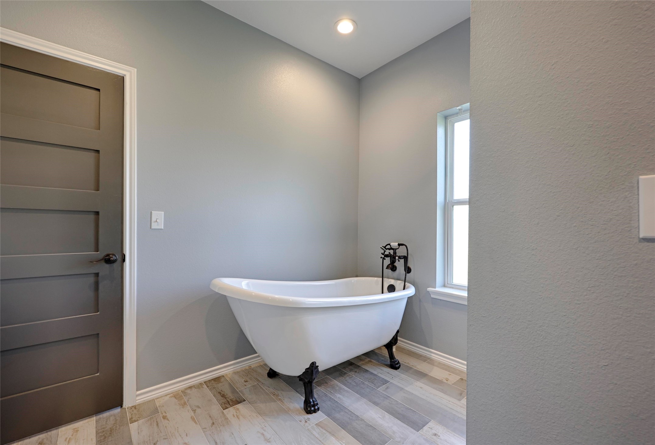 1100 Calhoun Road Eagle Lake, TX 77434 - Photo 30 of 48 a bathroom with a bathtub and shower