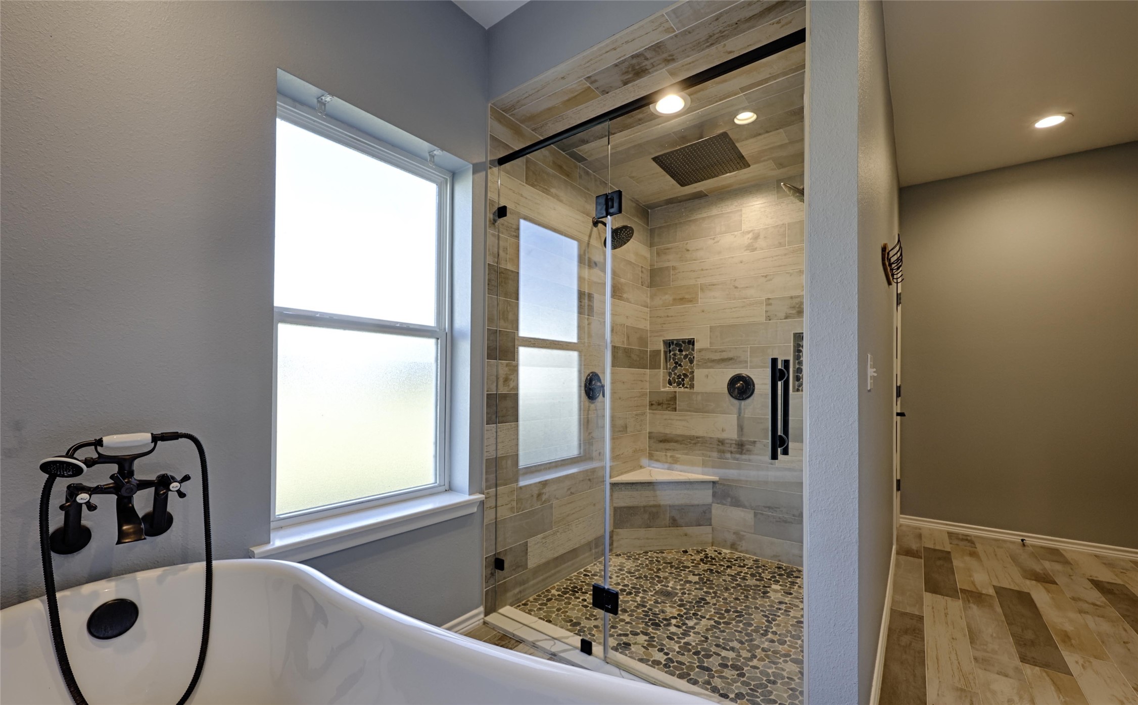 1100 Calhoun Road Eagle Lake, TX 77434 - Photo 31 of 48 a bathroom with a tub and a shower