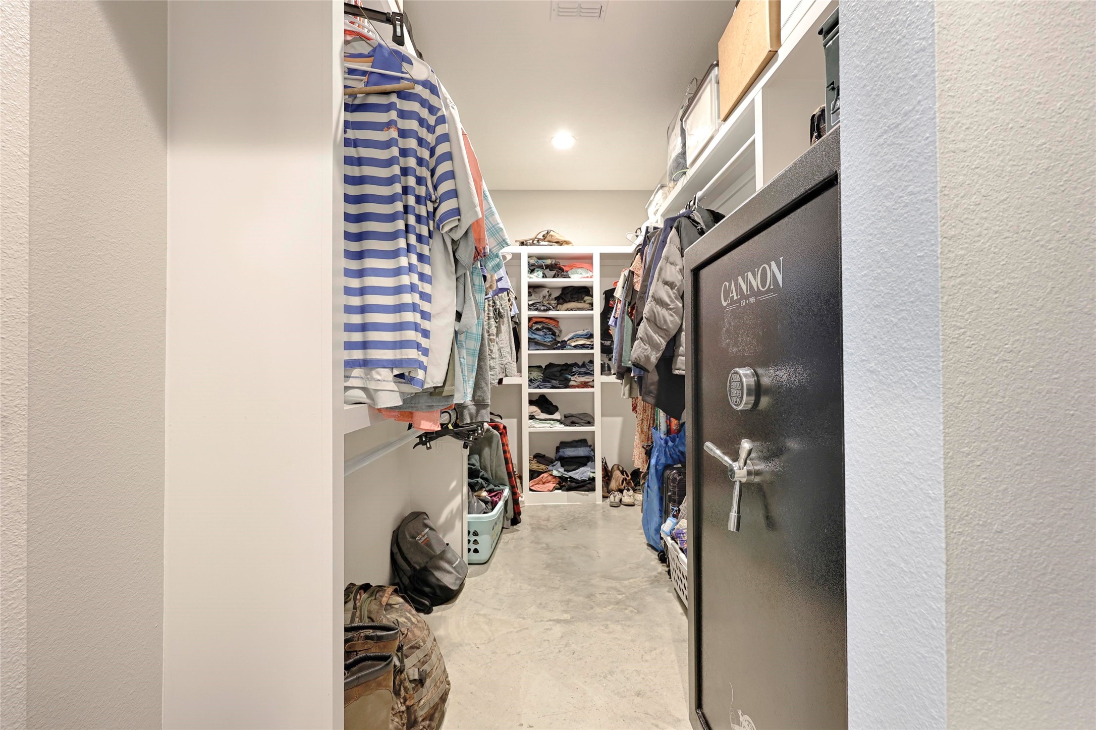 1100 Calhoun Road Eagle Lake, TX 77434 - Photo 33 of 48 a view of walk in closet with clothes and shoes