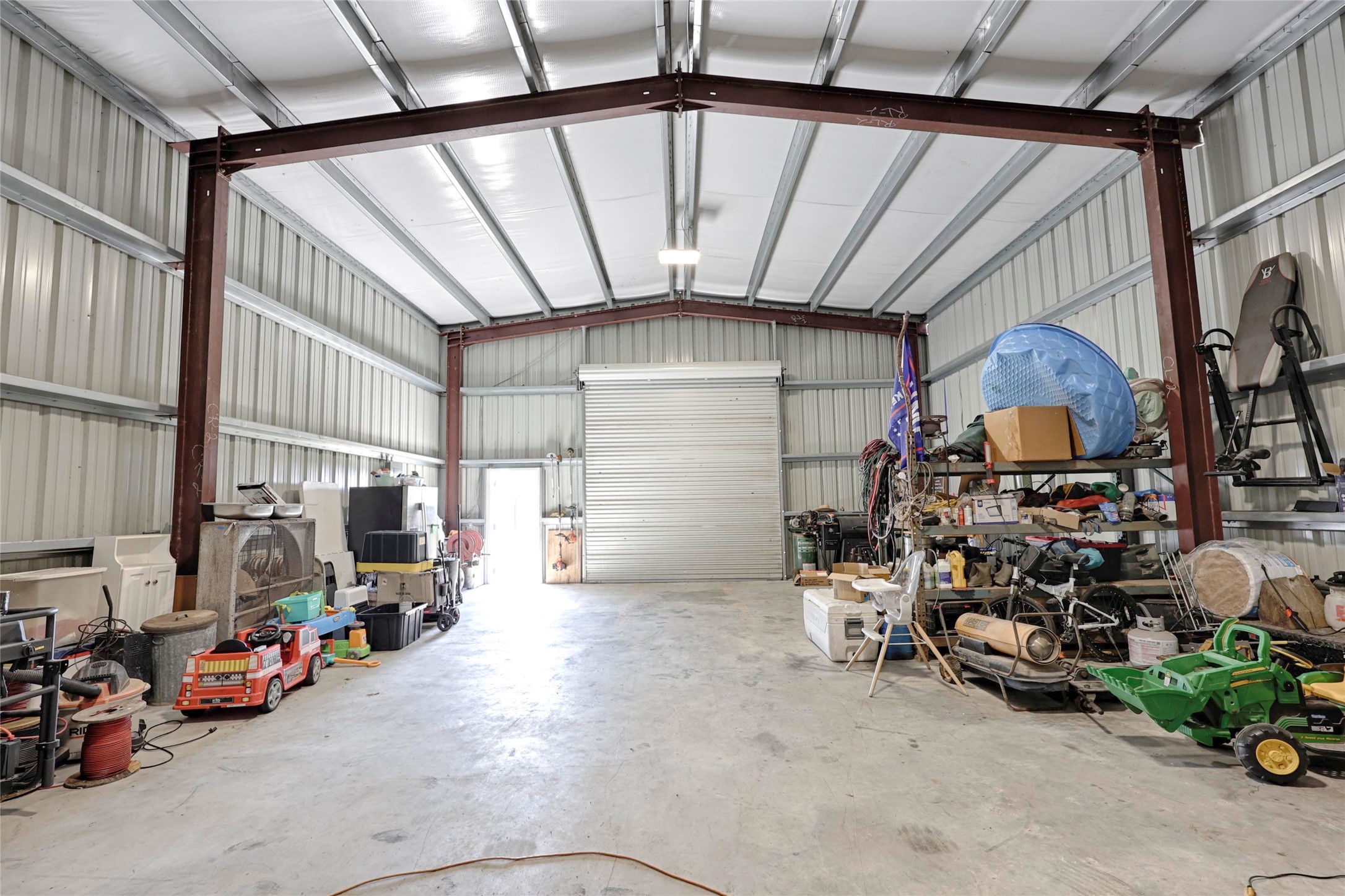 1100 Calhoun Road Eagle Lake, TX 77434 - Photo 45 of 48 a view of a garage with parked cars