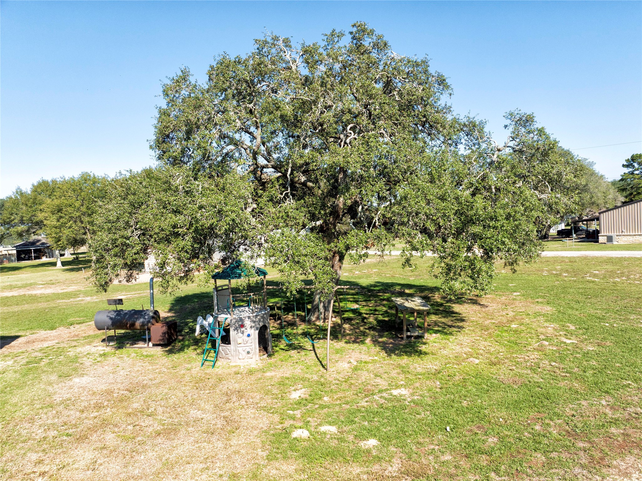 1100 Calhoun Road Eagle Lake, TX 77434 - Photo 47 of 48 a view of yard with swimming pool and sitting area