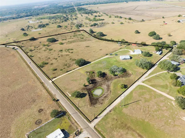 a living room with furniture fireplace and flat screen tv