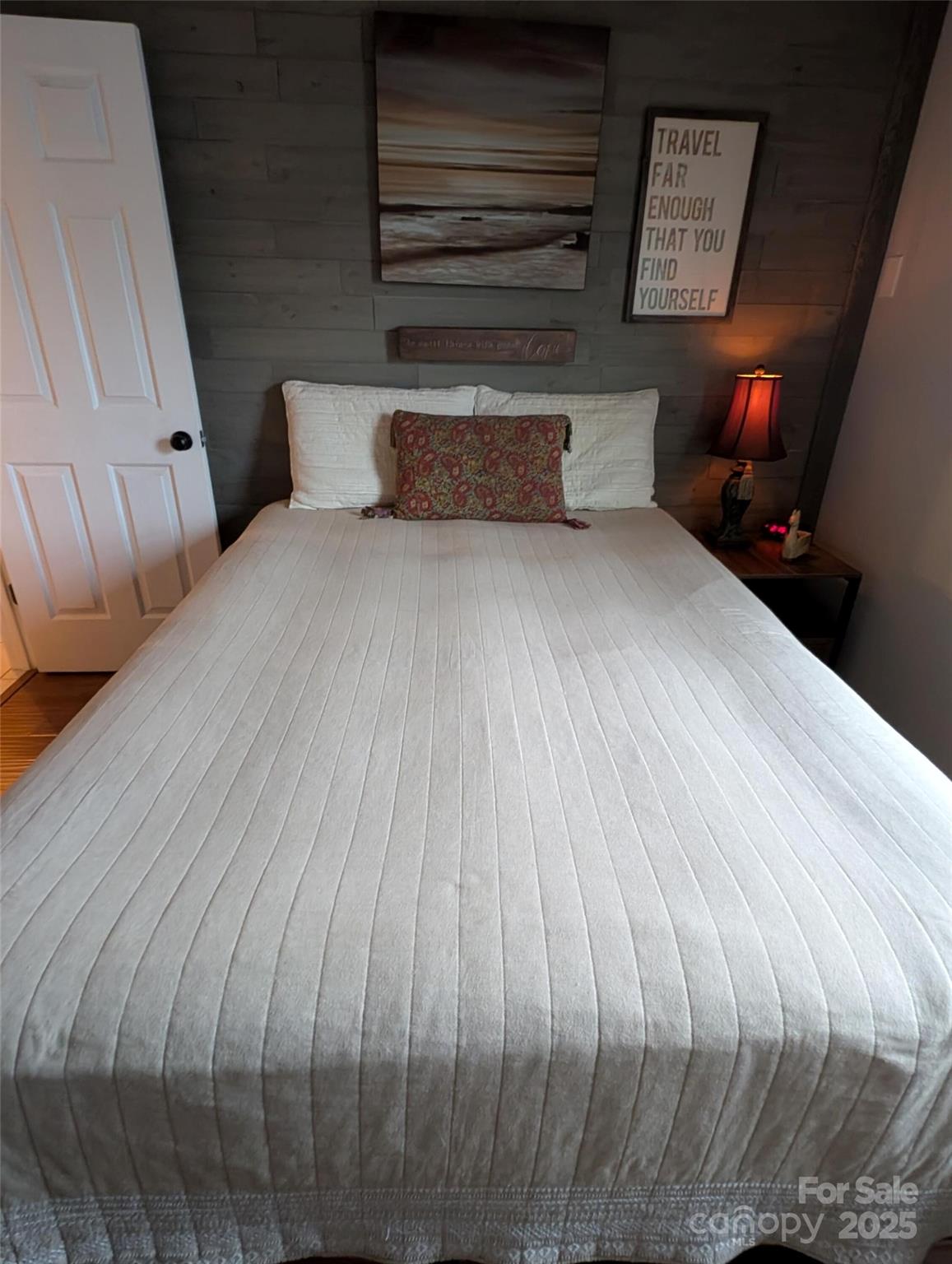 816 Maize Street Lexington, SC 29072 - Photo 14 of 34 a bedroom with a bed and wooden floor