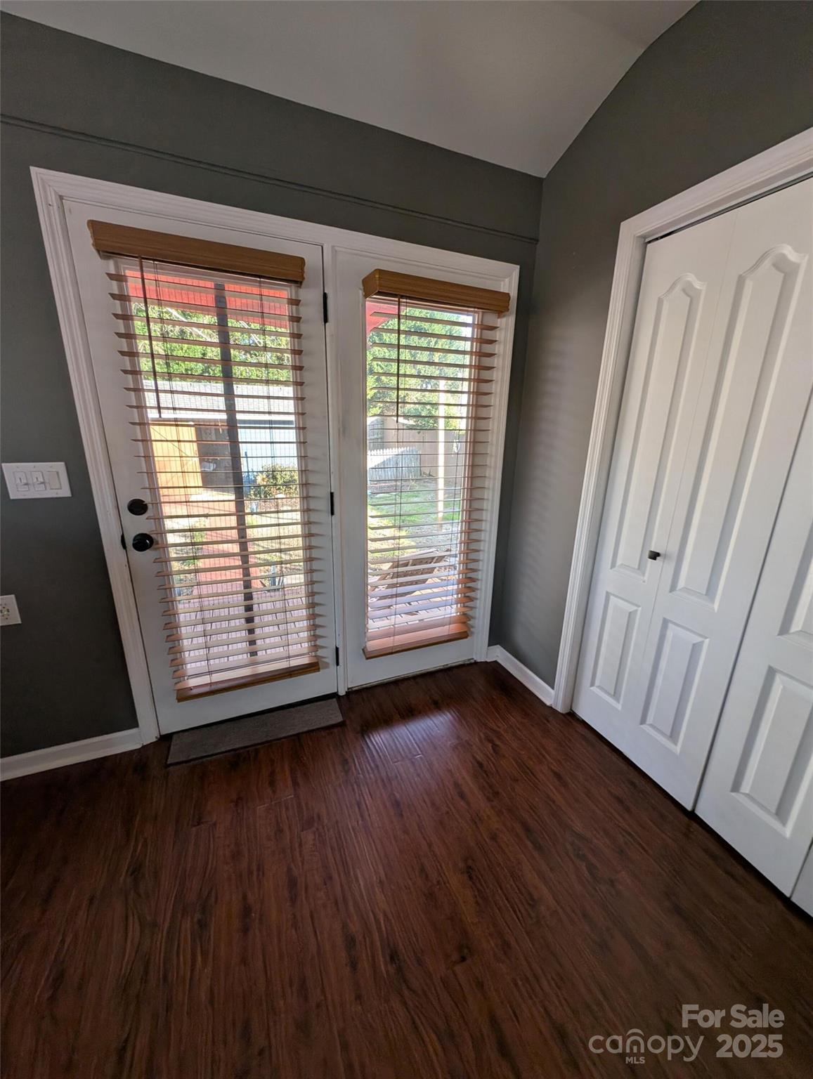 816 Maize Street Lexington, SC 29072 - Photo 30 of 34 a view of an empty room with wooden floor and a window
