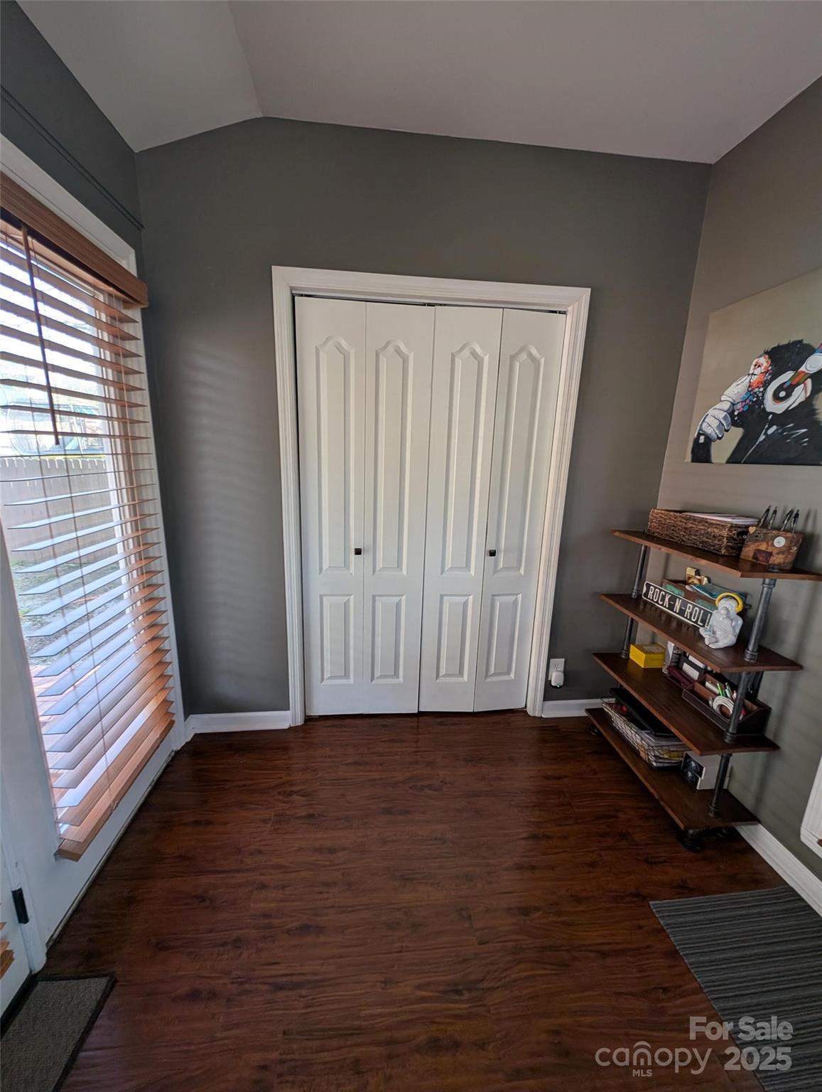 816 Maize Street Lexington, SC 29072 - Photo 31 of 34 a view of an empty room with wooden floor and a window