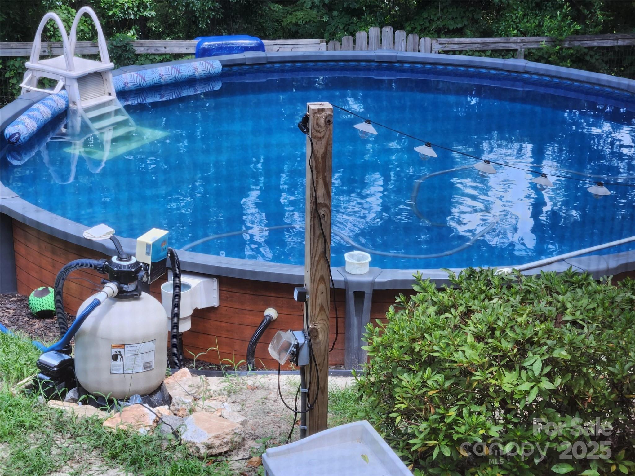 816 Maize Street Lexington, SC 29072 - Photo 4 of 34 a view of a backyard with plants and outdoor seating