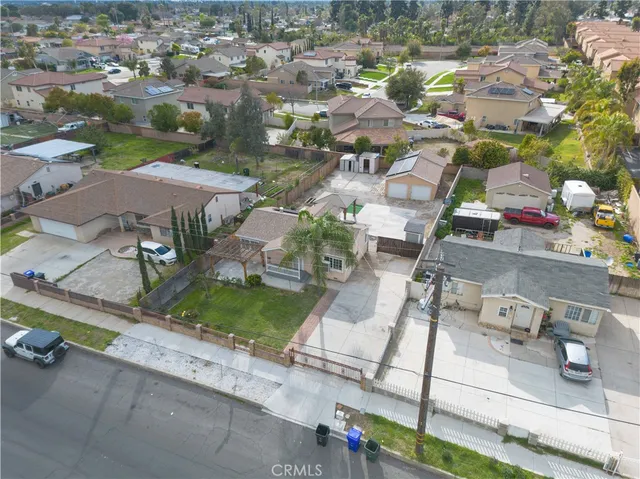 an aerial view of a houses with outdoor space