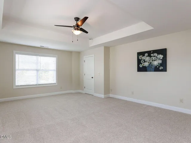a spacious bathroom with a shower and a bathtub