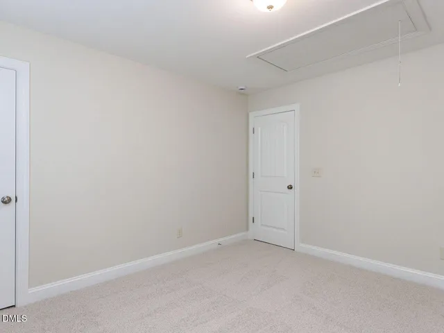 a view of a house with a large window