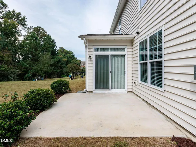 a lake view with a wooden bridge