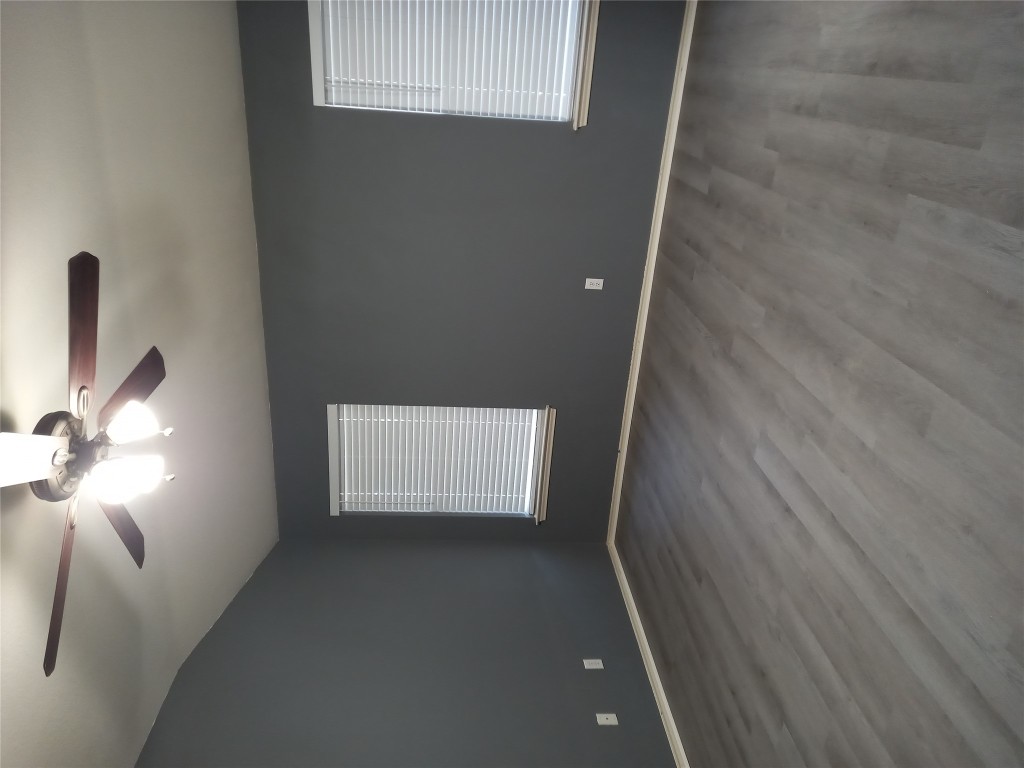 2018 Old Mill Road Cedar Park, TX 78613 - Photo 11 of 22 an empty room with windows and fan