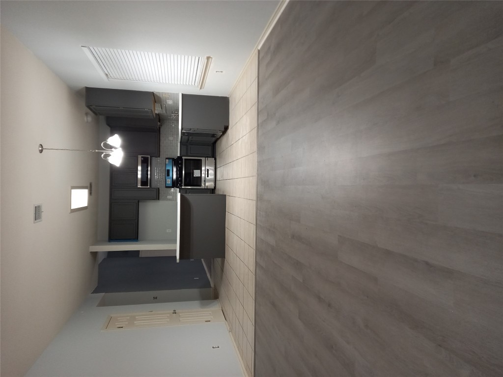 2018 Old Mill Road Cedar Park, TX 78613 - Photo 3 of 22 a view of a dining hall with couches and chandelier