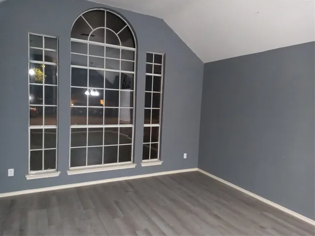 a bathroom with a sink vanity and a mirror