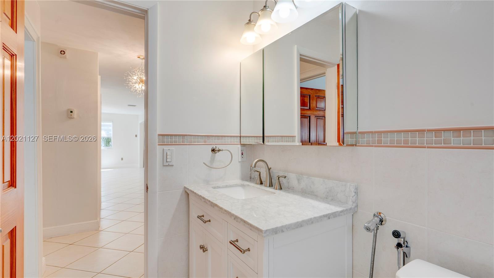 3611 Southwest 23rd Street Miami, FL 33145 - Photo 24 of 56 3613 - 2nd full bathroom in hallway between bedrooms 2 & 3