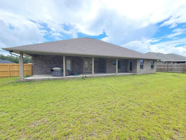 a view of a house with swimming pool