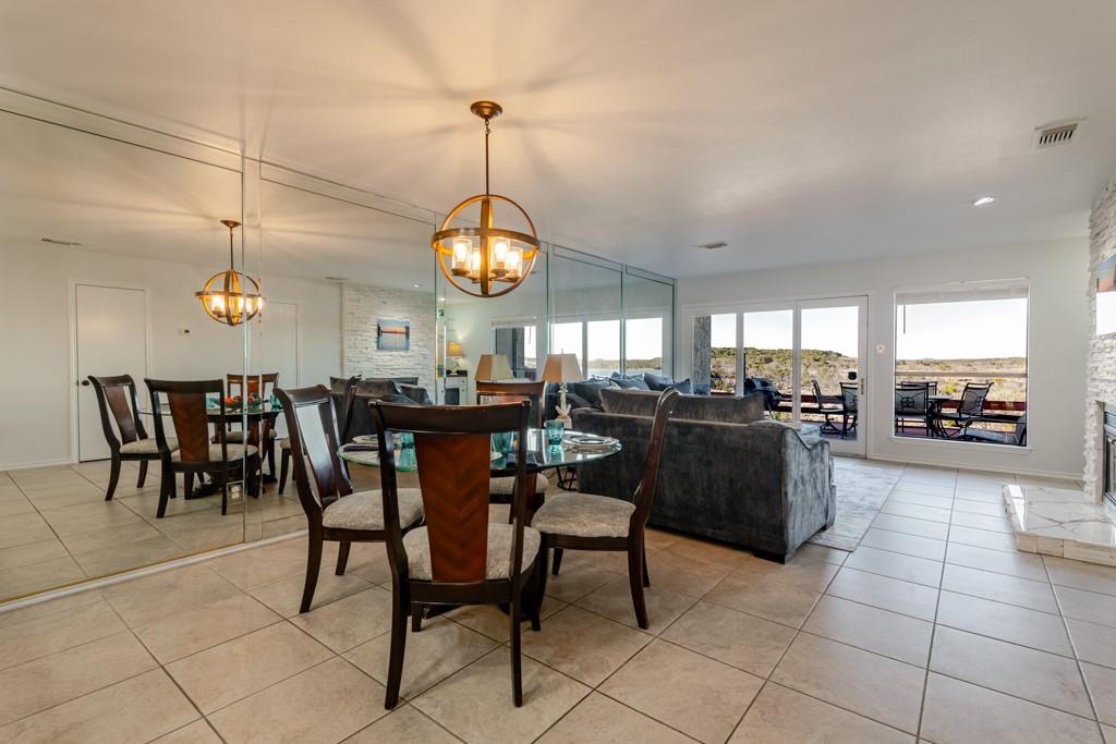 3107 Hells Gate Loop, Unit B62 Strawn, TX 76475 - Photo 12 of 24 a view of a dining room and livingroom view