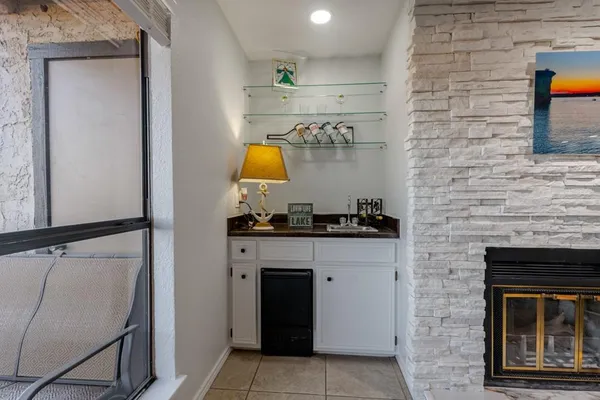a kitchen with a sink and a stove top oven