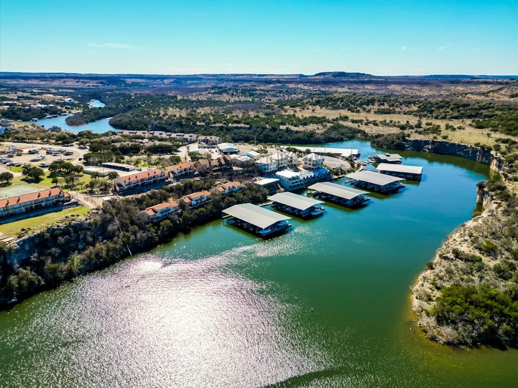 3107 Hells Gate Loop, Unit B62 Strawn, TX 76475 - Photo 24 of 24 a view of a city with lots of residential buildings and ocean view