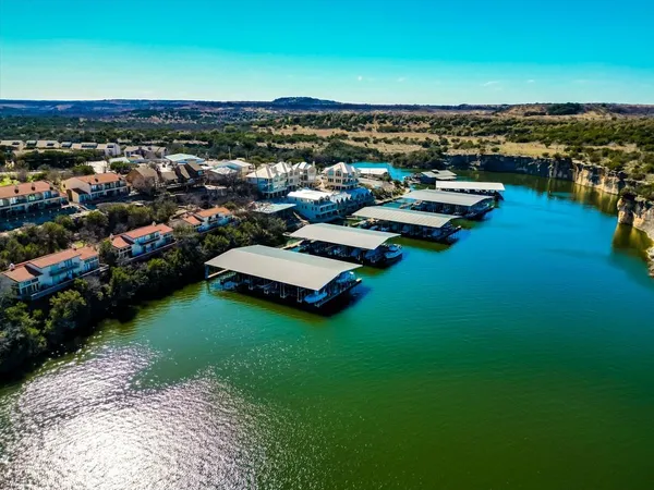 a view of a lake with multiple houses