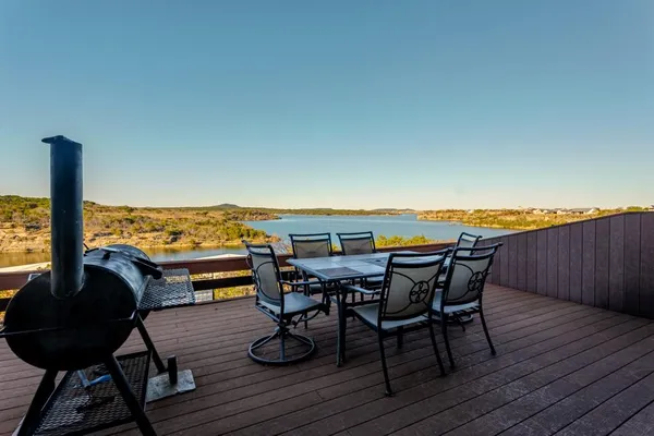 a view of a terrace with furniture