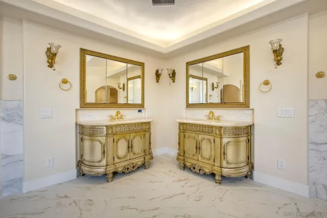 a view of a workspace with furniture and windows