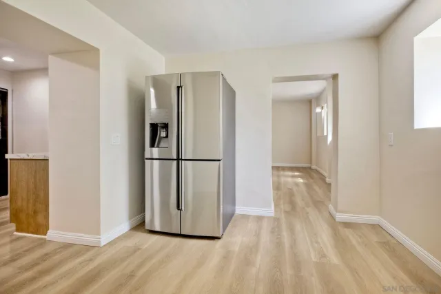a front view of a house with a yard garage and outdoor seating