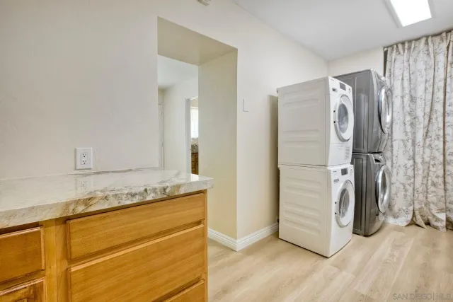 a aerial view of a house with a yard basket ball court and outdoor seating