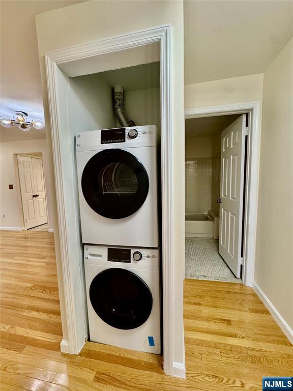 22 Regency Circle Englewood, NJ 07631 - Photo 11 of 21 a view of a hallway with washer and dryer