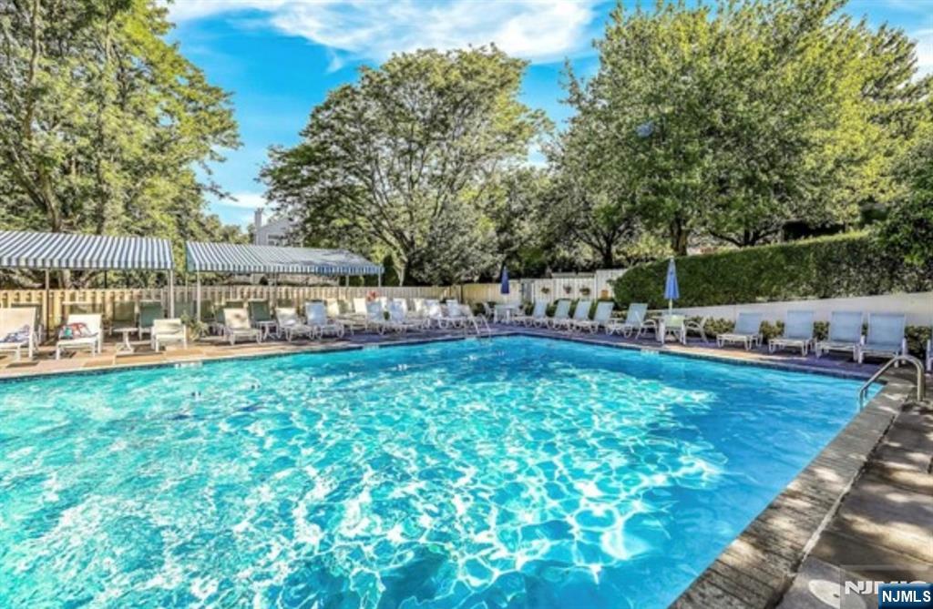 22 Regency Circle Englewood, NJ 07631 - Photo 20 of 21 a view of a yard with large trees